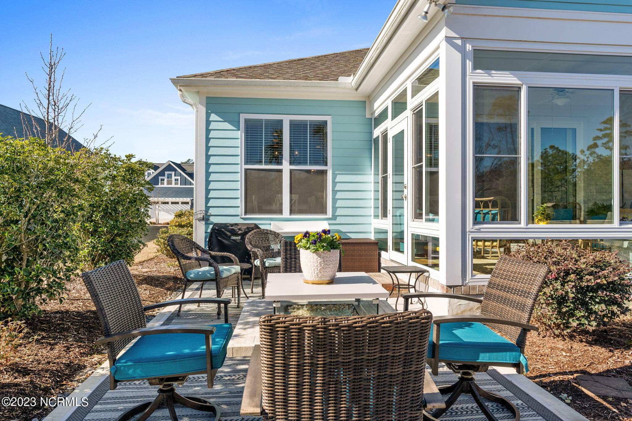 1423 Long Pond Road Southwest Ocean Isle Beach, NC 28469 - Photo 10 of 57 Fire table and outside furniture does not convey