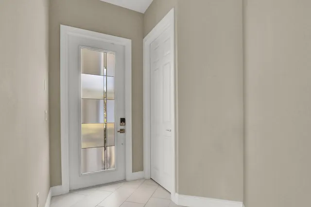 a view of a bathroom with a glass door