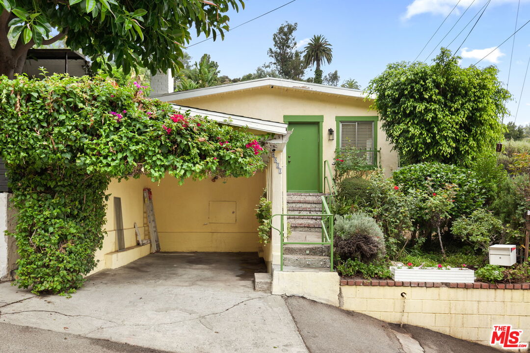 8527 Walnut Drive Los Angeles, CA 90046 - Photo 1 of 16 a view of a house with a tree