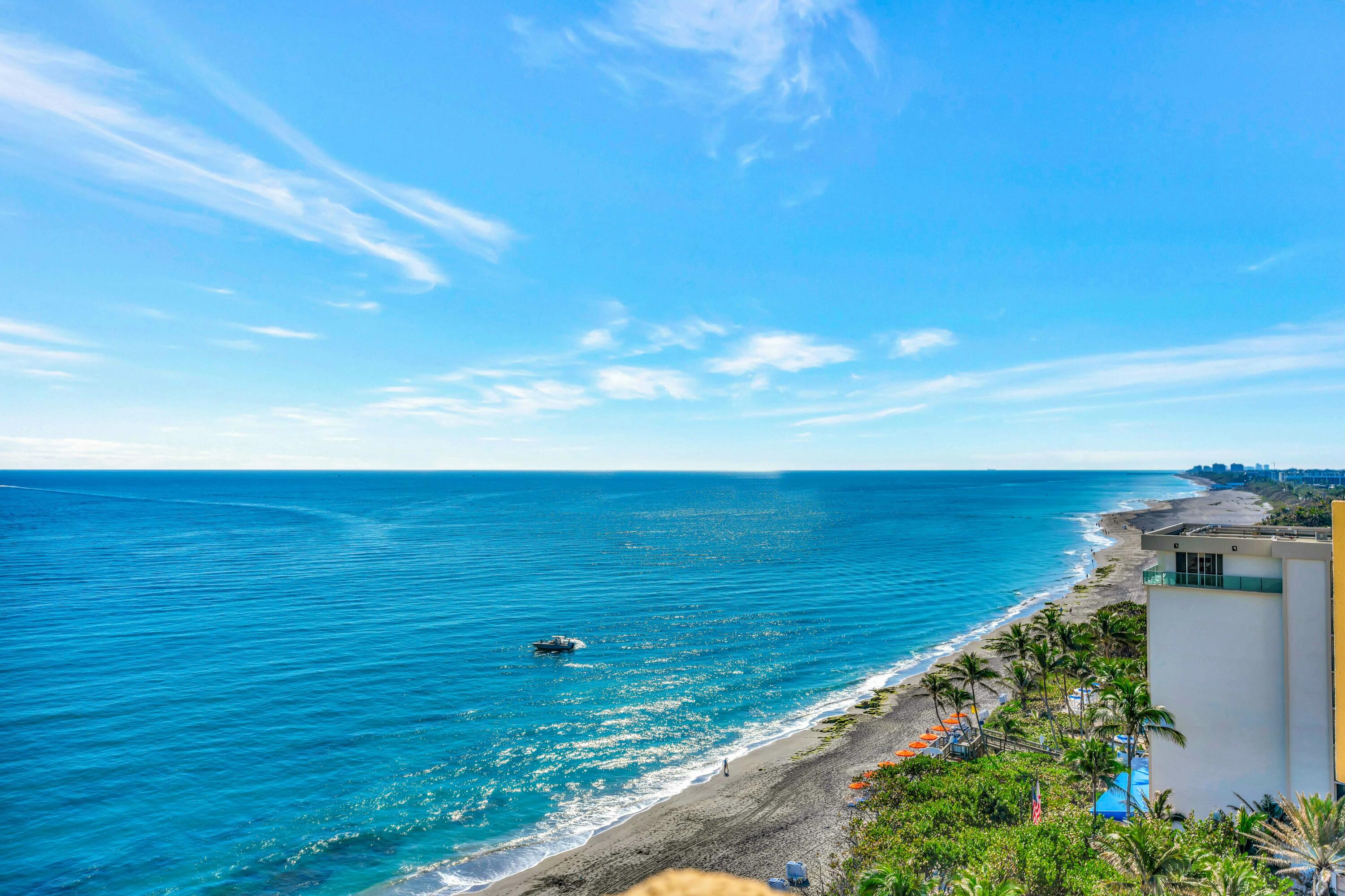 100 Ocean Trail Way, Unit 1201 Jupiter, FL 33477 - Photo 32 of 61 an aerial view of beach and ocean
