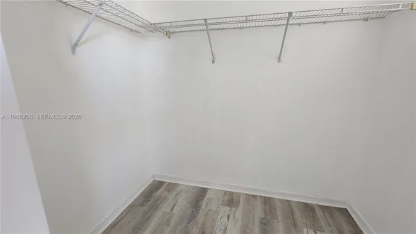 a view of a room with racks on the wall