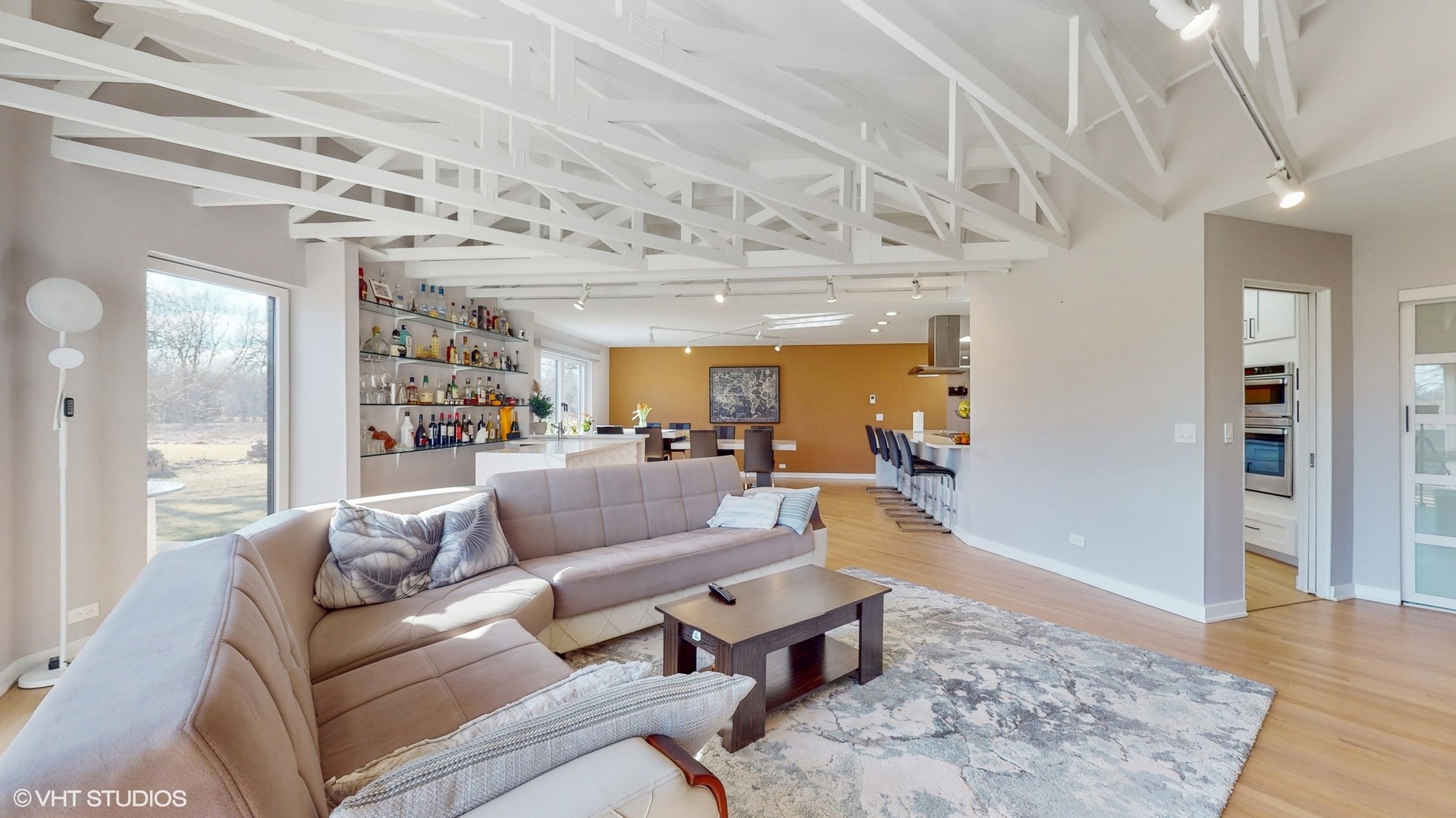 711 Lee Road Northbrook, IL 60062 - Photo 11 of 30 a living room with furniture and a chandelier
