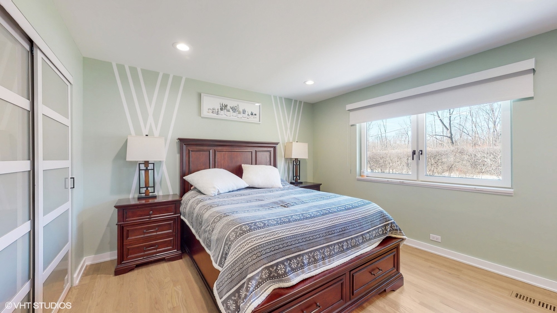 711 Lee Road Northbrook, IL 60062 - Photo 18 of 30 a bedroom with a bed and a window