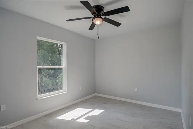 a bathroom with a sink and vanity