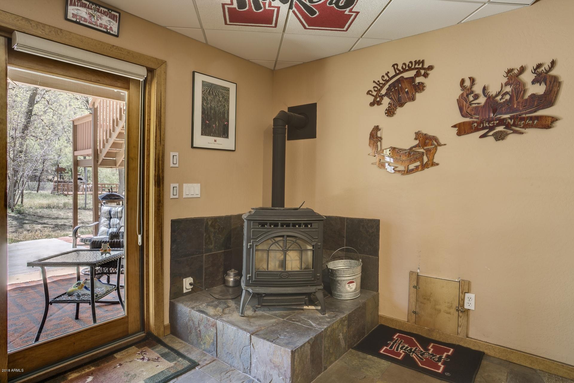 9247 Juniper Road Strawberry, AZ 85544 - Photo 38 of 54 Pellet stove