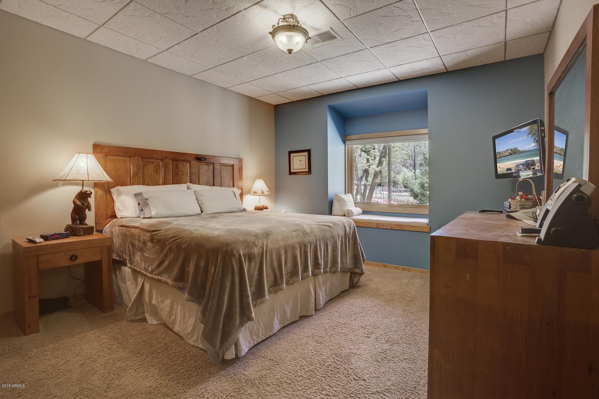 9247 Juniper Road Strawberry, AZ 85544 - Photo 40 of 54 Lower level bedroom