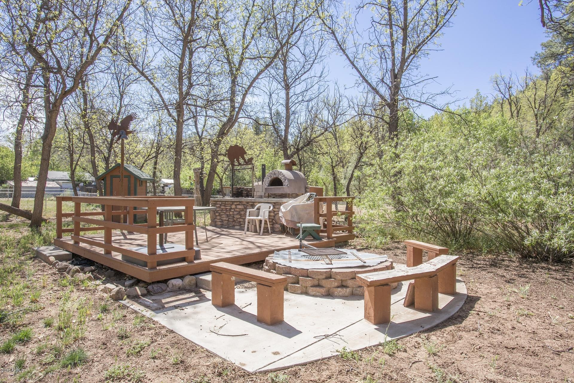 9247 Juniper Road Strawberry, AZ 85544 - Photo 43 of 54 Outdoor kitchen & firepit