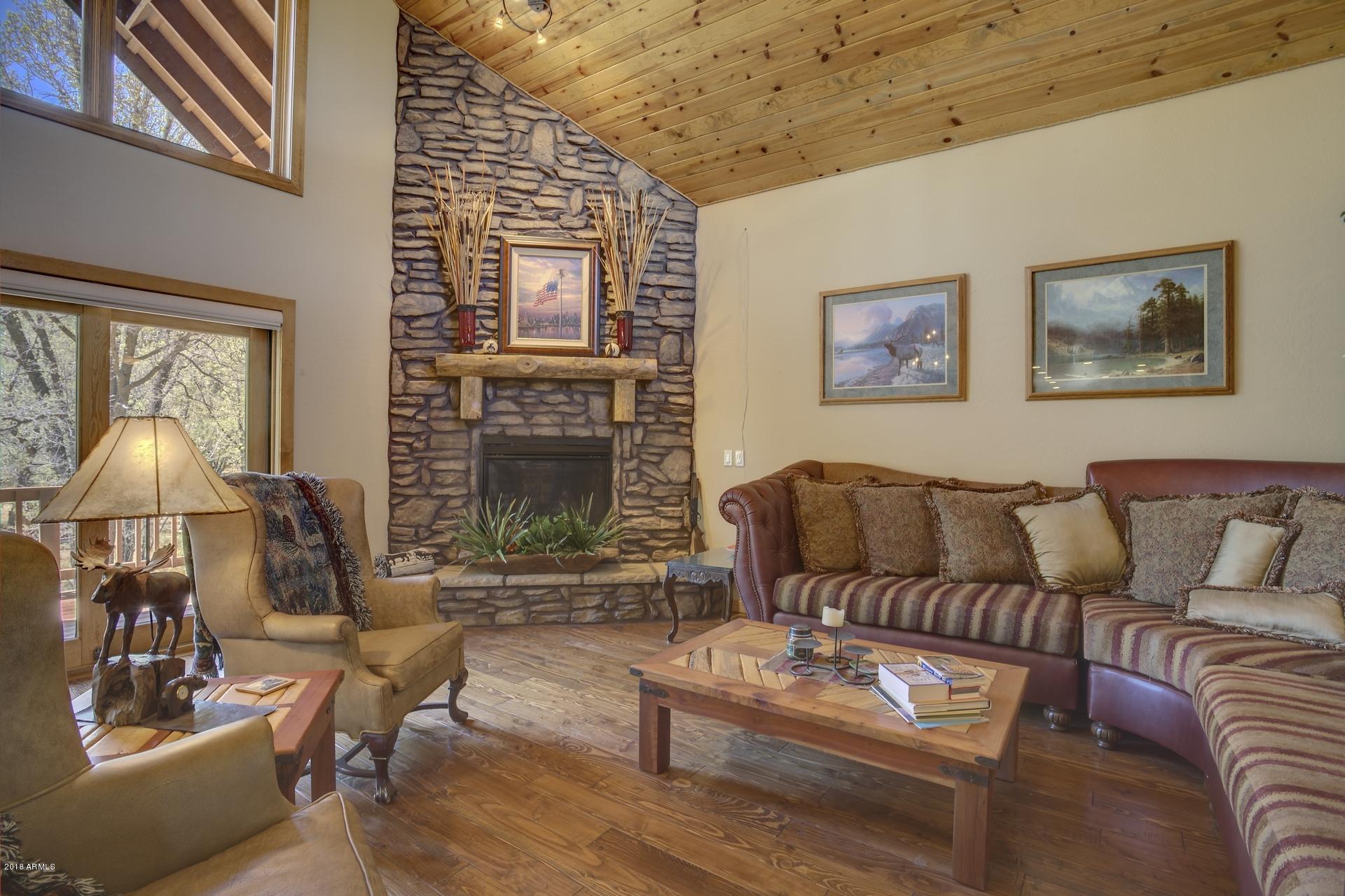 9247 Juniper Road Strawberry, AZ 85544 - Photo 5 of 54 Greatroom - Fireplace