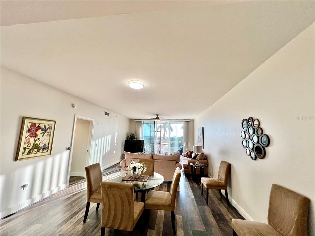 3321 Sunset Key Circle, Unit 102 Punta Gorda, FL 33955 - Photo 15 of 57 a view of a dining room with furniture