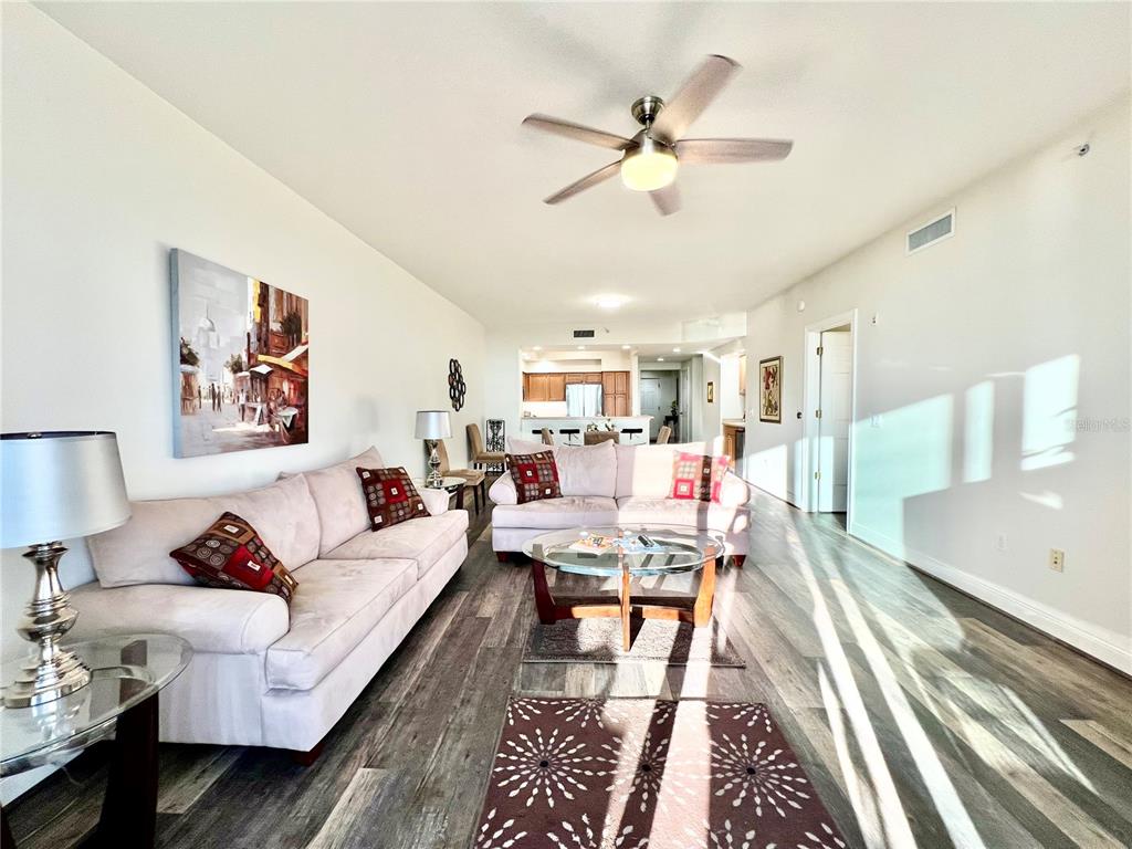 3321 Sunset Key Circle, Unit 102 Punta Gorda, FL 33955 - Photo 19 of 57 a living room with furniture and a rug
