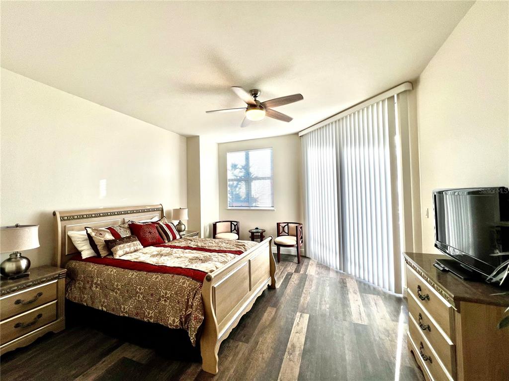 3321 Sunset Key Circle, Unit 102 Punta Gorda, FL 33955 - Photo 27 of 57 a bed room with a bed and a television