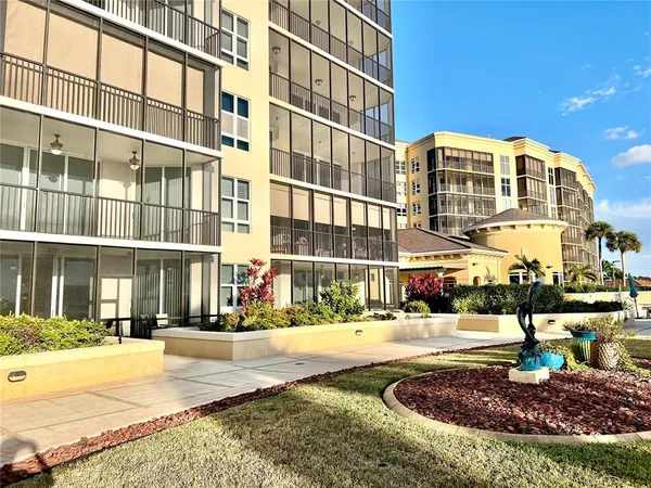 a bathroom with a shower and a window