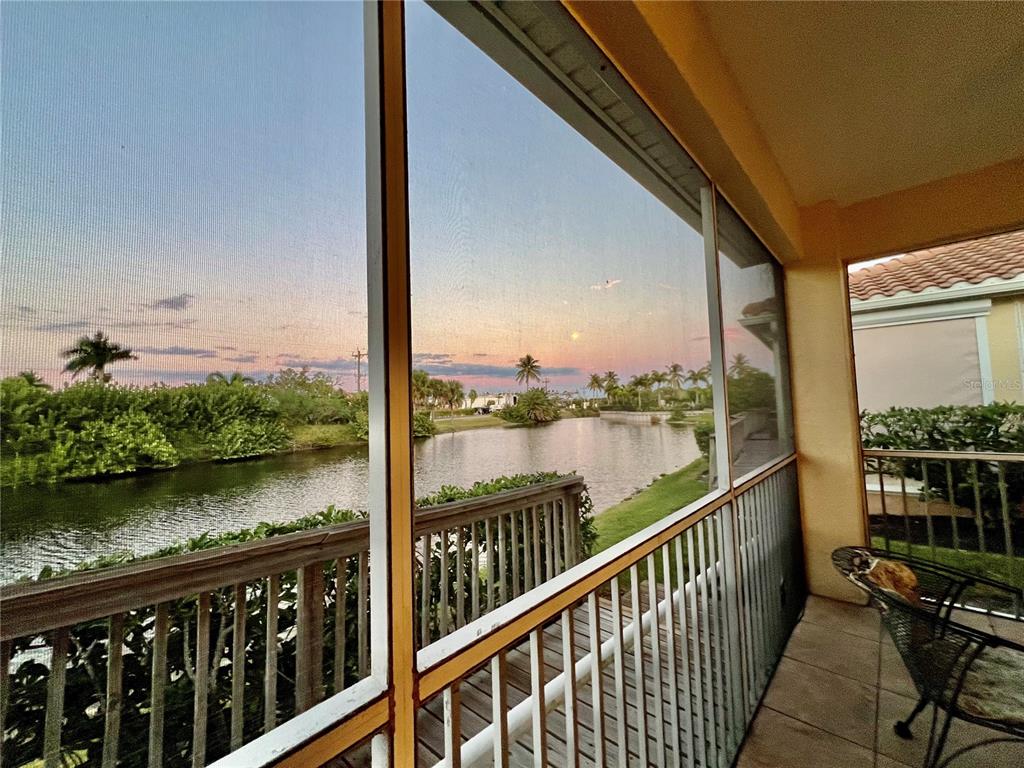 3321 Sunset Key Circle, Unit 102 Punta Gorda, FL 33955 - Photo 4 of 56 a view of ocean from balcony