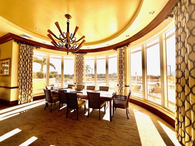 3321 Sunset Key Circle, Unit 102 Punta Gorda, FL 33955 - Photo 48 of 57 a view of a dining room with furniture window and outside view