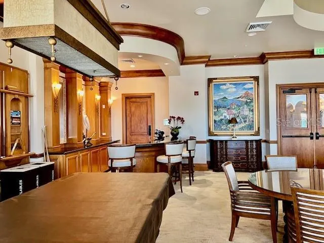 a view of a palm trees front of a house