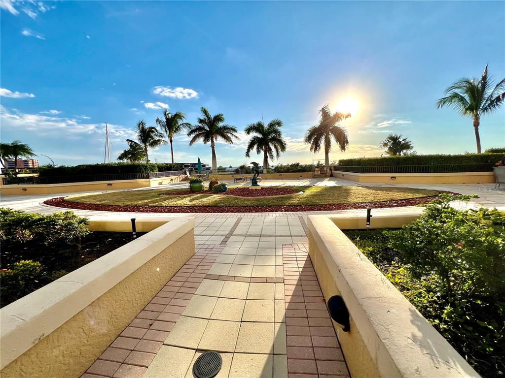 3321 Sunset Key Circle, Unit 102 Punta Gorda, FL 33955 - Photo 10 of 57 a view of a swimming pool with an outdoor seating
