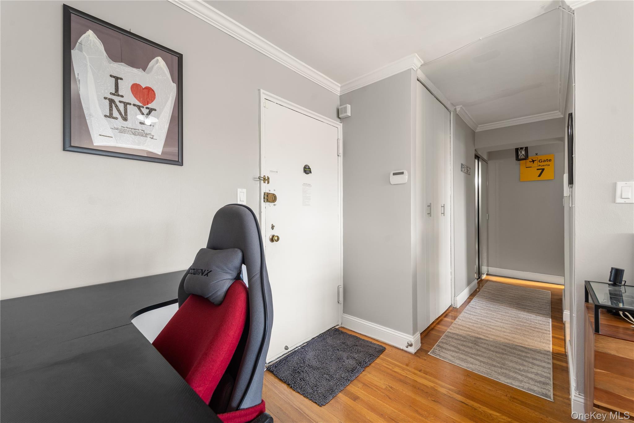 211-40 18th Avenue, Unit 6J Queens, NY 11360 - Photo 17 of 26 a view of a hallway with closet