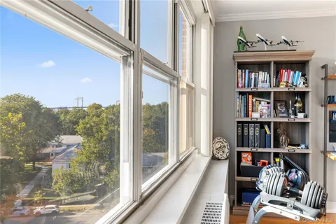 a view of a living room and a balcony