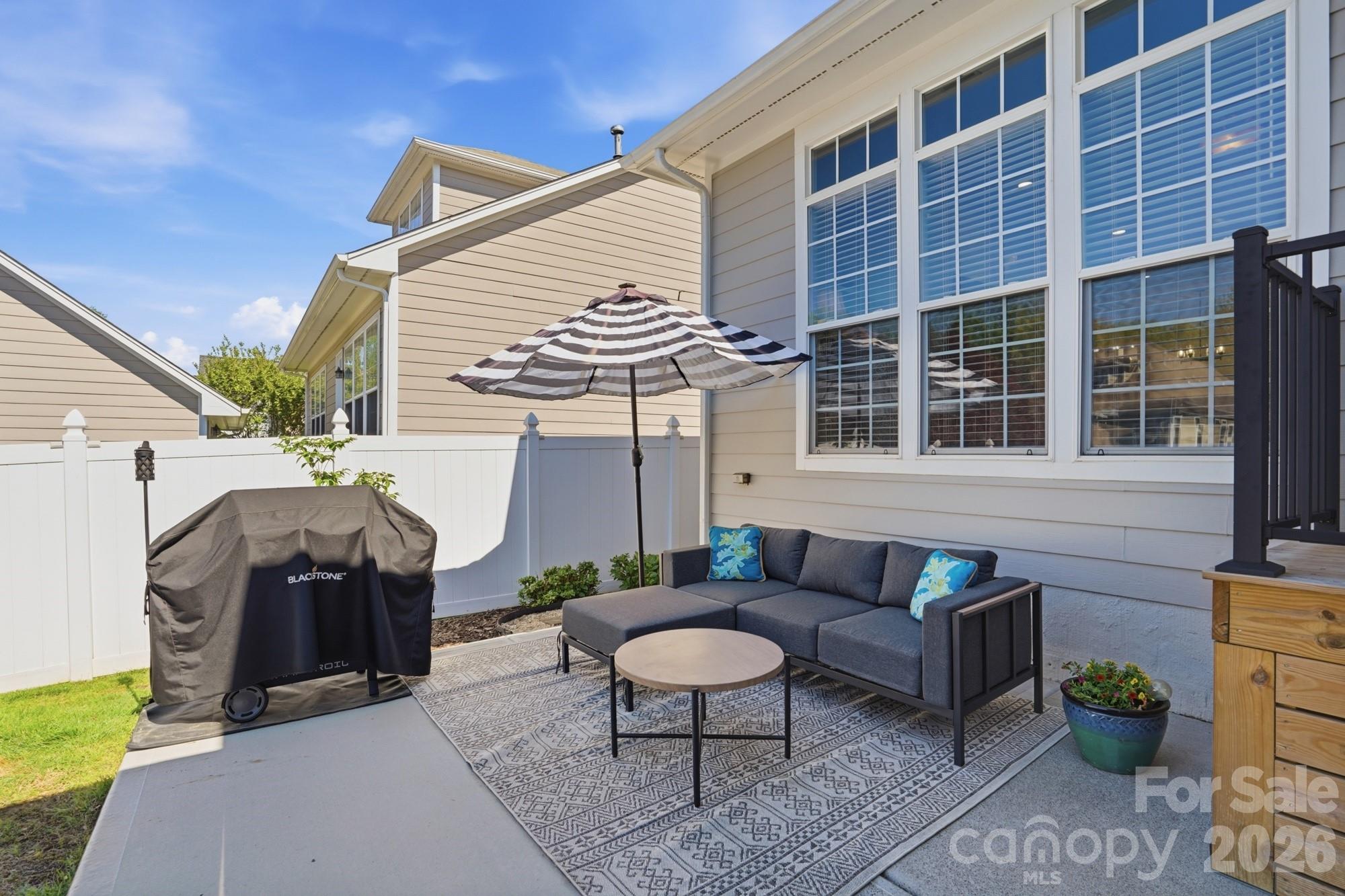 17029 Carlton Way Road Huntersville, NC 28078 - Photo 23 of 39 a view of a patio with a chairs and table in a patio