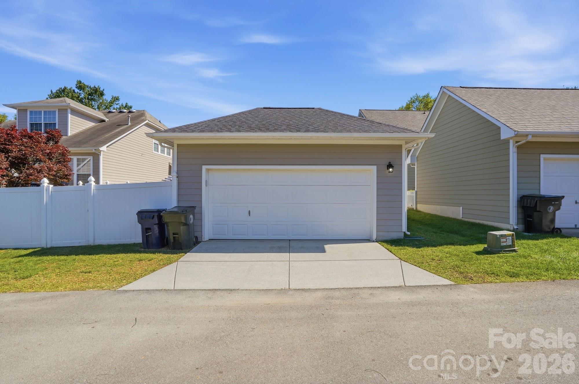 17029 Carlton Way Road Huntersville, NC 28078 - Photo 27 of 39 a front view of a house with yard and garage