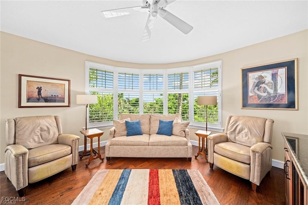 2675 Wulfert Road, Unit 6 Sanibel, FL 33957 - Photo 15 of 47 a living room with furniture and a large window