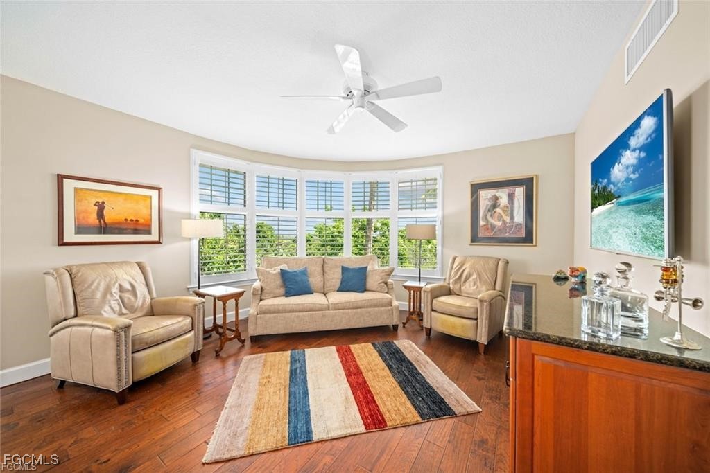 2675 Wulfert Road, Unit 6 Sanibel, FL 33957 - Photo 16 of 47 a living room with furniture and a large window