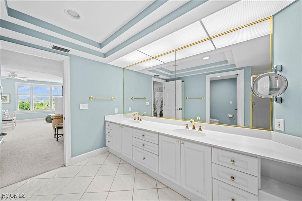 2675 Wulfert Road, Unit 6 Sanibel, FL 33957 - Photo 23 of 47 a spacious bathroom with a double vanity sink mirror and