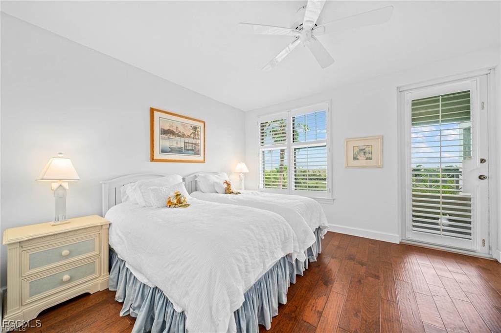 2675 Wulfert Road, Unit 6 Sanibel, FL 33957 - Photo 27 of 47 a bedroom with a bed and a window