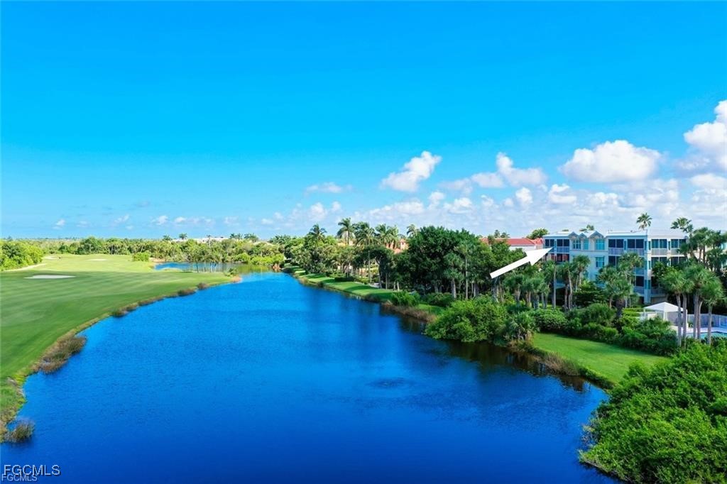 2675 Wulfert Road, Unit 6 Sanibel, FL 33957 - Photo 3 of 47 a view of a lake with a big yard