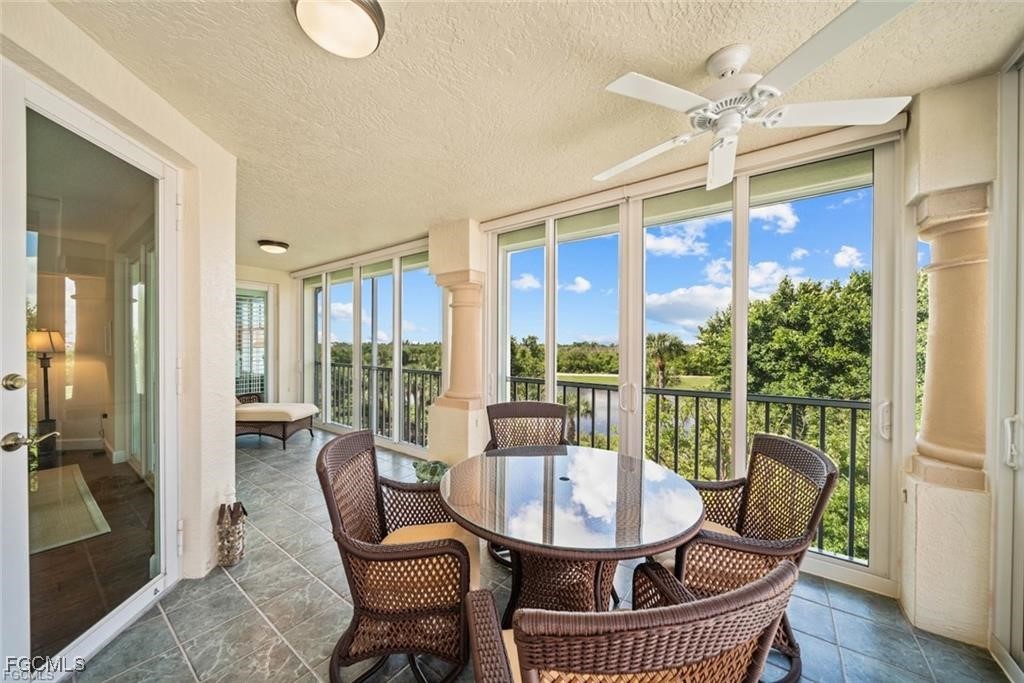2675 Wulfert Road, Unit 6 Sanibel, FL 33957 - Photo 37 of 47 a view of a dining room with furniture window and wooden floor