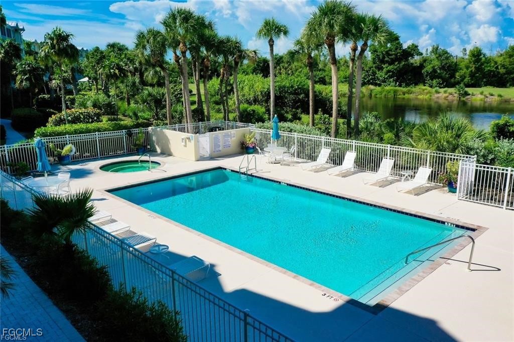 2675 Wulfert Road, Unit 6 Sanibel, FL 33957 - Photo 42 of 47 a view of a patio with chairs and a table
