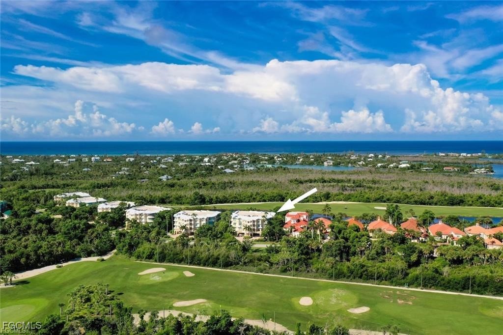 2675 Wulfert Road, Unit 6 Sanibel, FL 33957 - Photo 46 of 47 a view of a lake with a city view