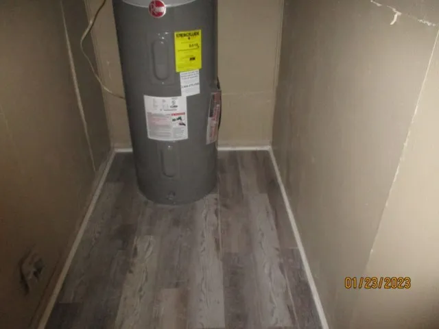 view of a hallway with wooden floor