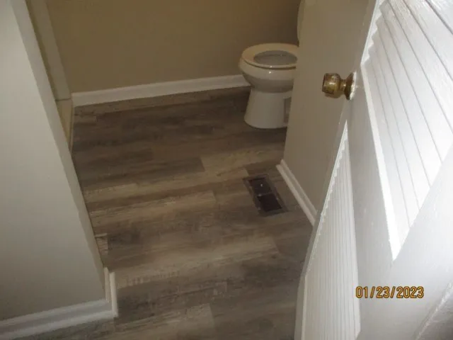 a bathroom with a sink and toilet