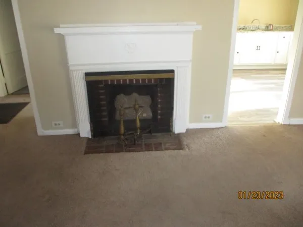 a living room with a fireplace