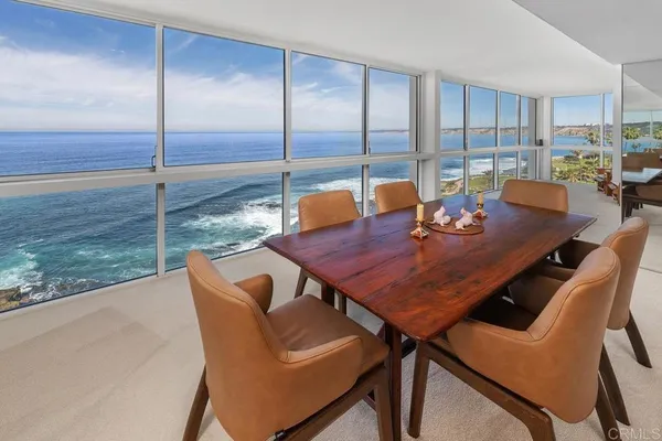 a view of a dining room with furniture