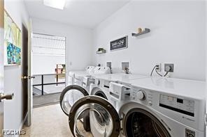 708 Victoria Drive, Unit 206 Cape Coral, FL 33904 - Photo 17 of 17 a view of livingroom with washer and dryer