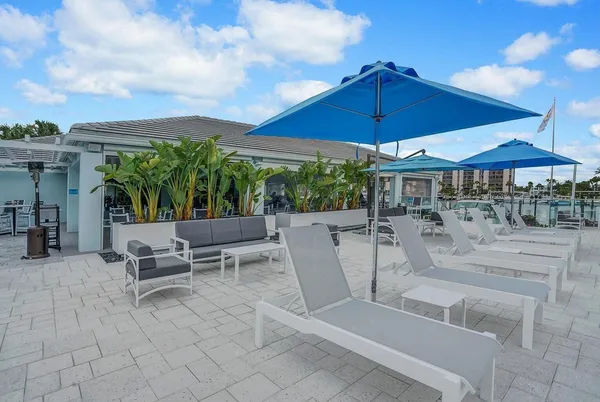 a view of a swimming pool with a patio