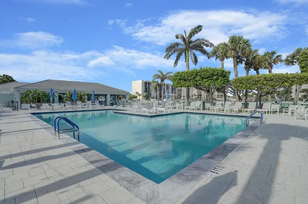 a view of a swimming pool and a terrace