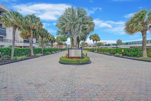 a view of a garden with a fountain