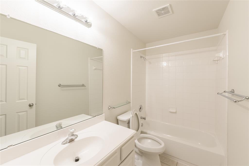 1627 Balboa Lane Allen, TX 75002 - Photo 18 of 23 a bathroom with a sink toilet and shower