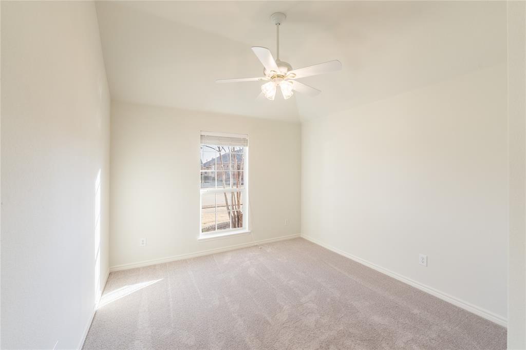 1627 Balboa Lane Allen, TX 75002 - Photo 20 of 23 an empty room with windows and fan