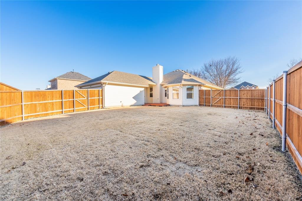 1627 Balboa Lane Allen, TX 75002 - Photo 22 of 23 a view of a house with a yard
