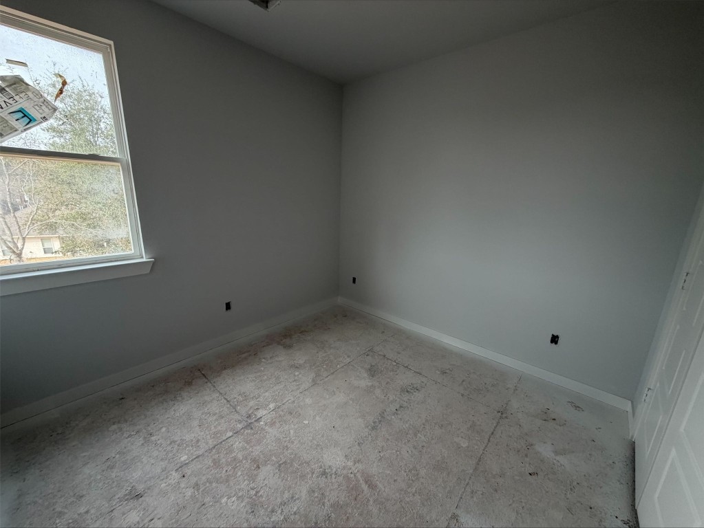 3714 Violet Lane Huntsville, TX 77340 - Photo 14 of 18 an empty room with a window