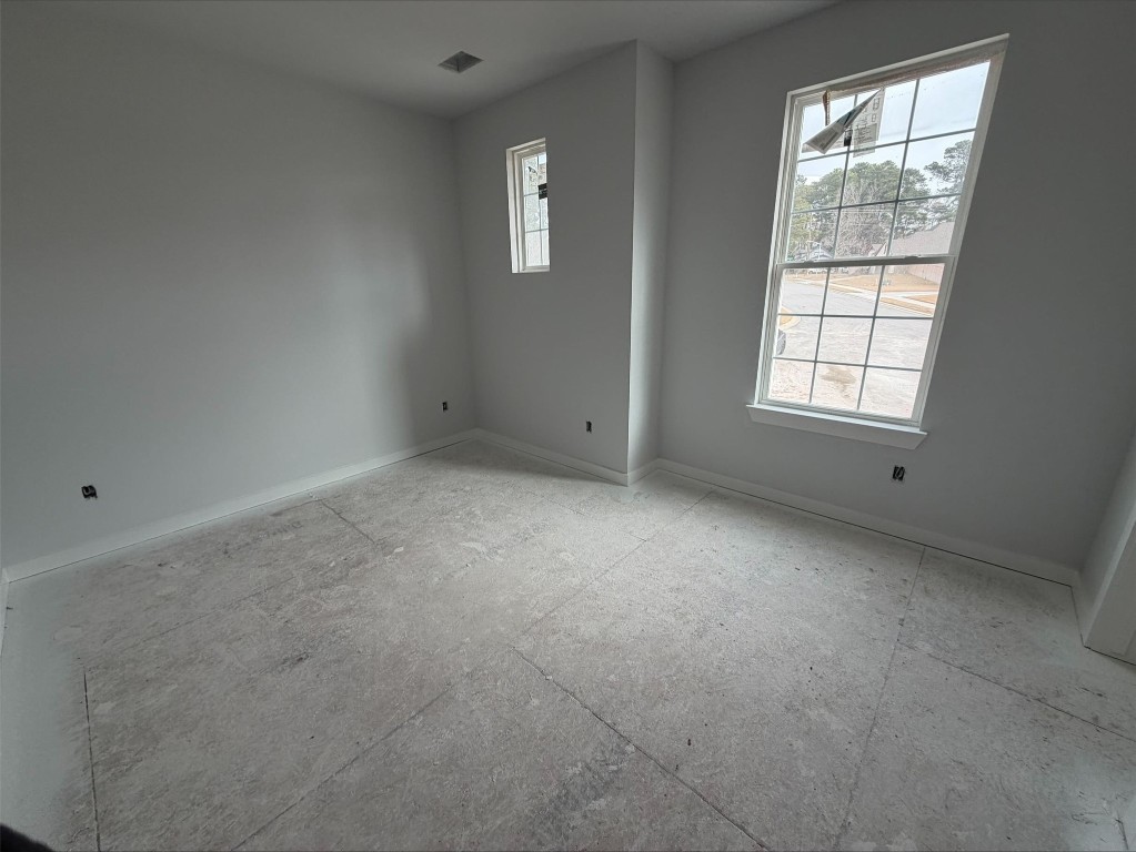 3714 Violet Lane Huntsville, TX 77340 - Photo 17 of 18 an empty room with a window