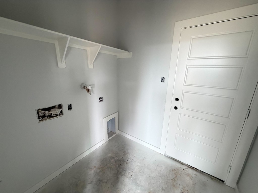 3714 Violet Lane Huntsville, TX 77340 - Photo 6 of 18 a view of walk in closet with empty racks