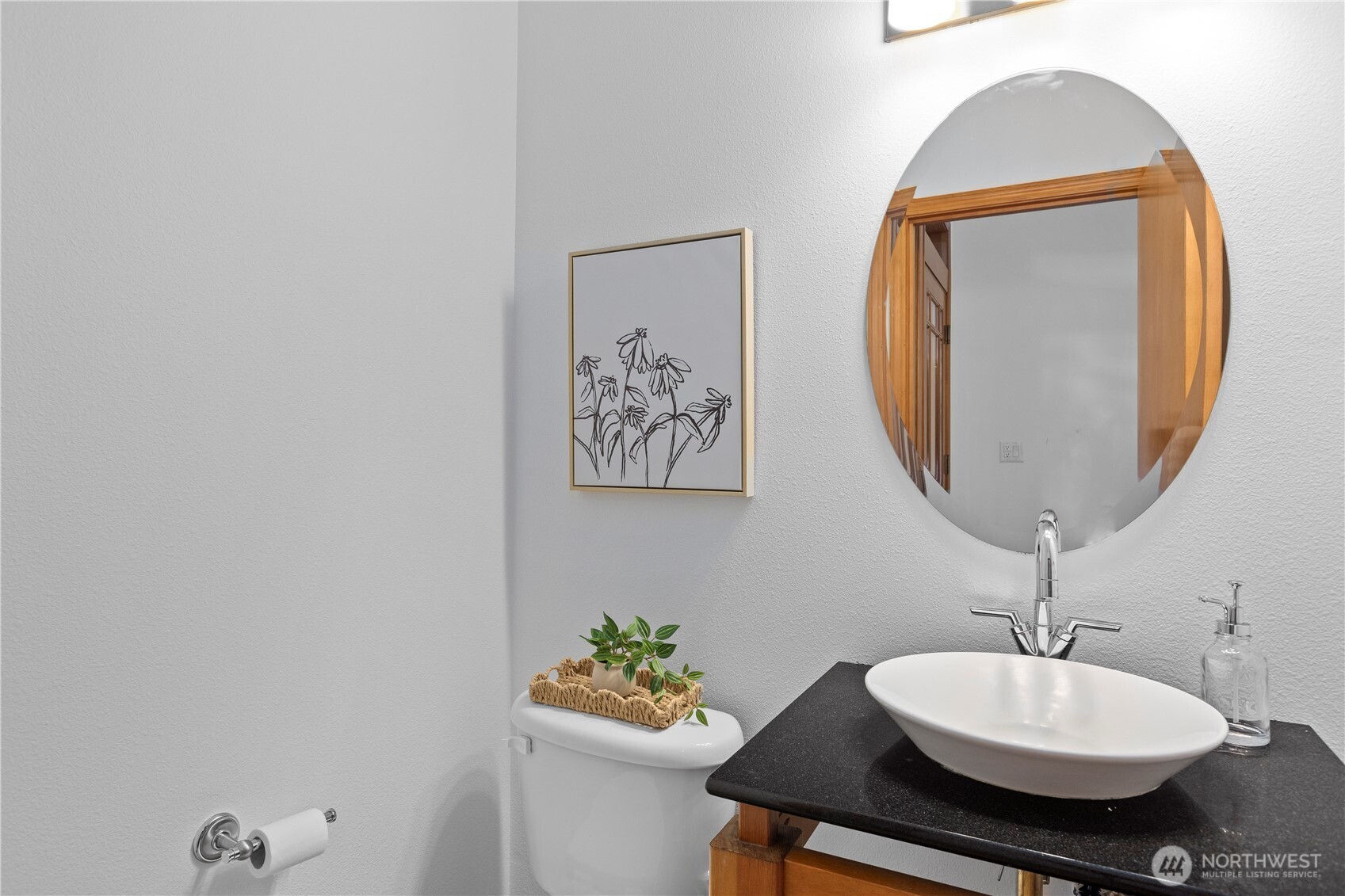 730 Southeast Nelson Road Shelton, WA 98584 - Photo 11 of 40 a bathroom with a sink a mirror and a lamp