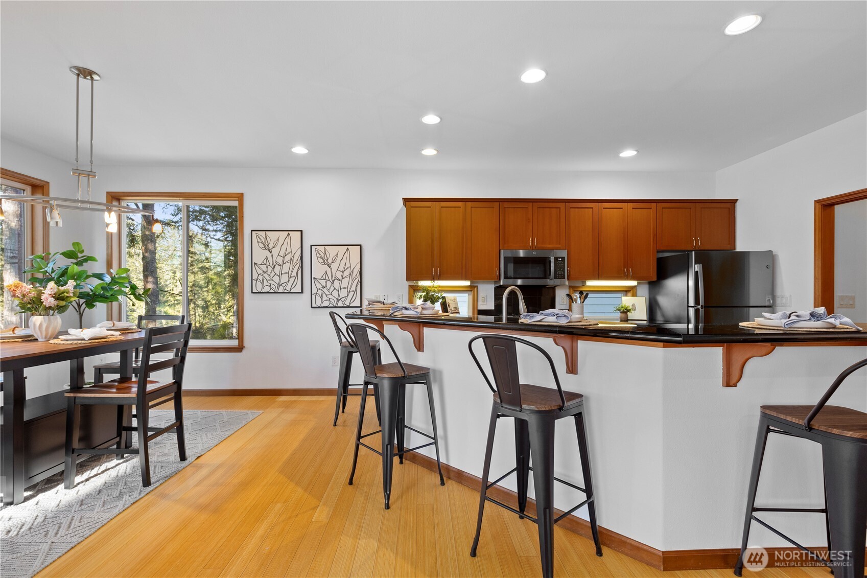 730 Southeast Nelson Road Shelton, WA 98584 - Photo 14 of 40 a view of a dining room with furniture window and wooden floor
