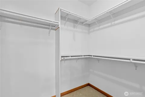 a view of an empty walk in closet