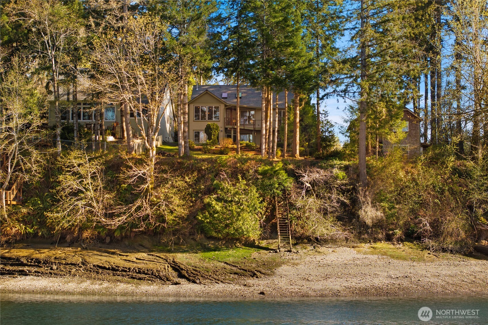 730 Southeast Nelson Road Shelton, WA 98584 - Photo 3 of 40 a front view of a house with a yard